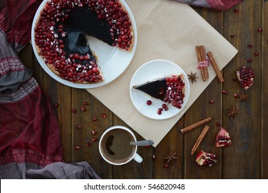 Cake With Jelly, Cranberry And Pomegranate On A Brown Wooden Table. Gala Dinner View From The Top