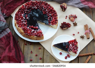 Cake With Jelly, Cranberry And Pomegranate On A Brown Wooden Table. Gala Dinner View From The Top