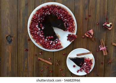 Cake With Jelly, Cranberry And Pomegranate On A Brown Wooden Table. Gala Dinner View From The Top