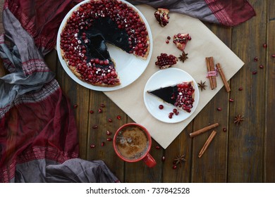 Cake With Jelly, Cranberry And Pomegranate On A Brown Wooden Table. Gala Dinner View From The Top