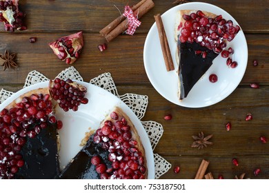 Cake With Jelly, Cranberry And Pomegranate On A Brown Wooden Table. Gala Dinner View From The Top