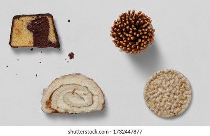 Cake, Lemon Cake Roll, Salt Sticks And Corn Waffle On A White Background