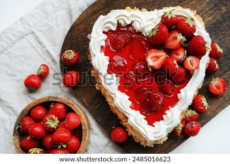 Similar – Strawberry tartlet in heart shape