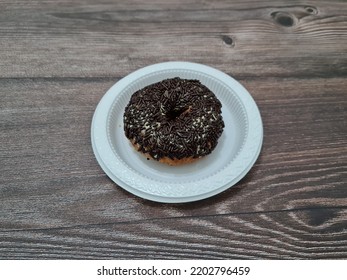 Cake Made From Flour And Other Ingredients, Namely Donut Cake Sprinkled With Chocolate Messes