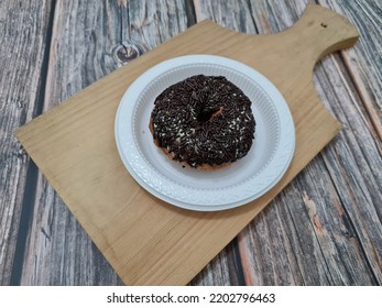 Cake Made From Flour And Other Ingredients, Namely Donut Cake Sprinkled With Chocolate Messes