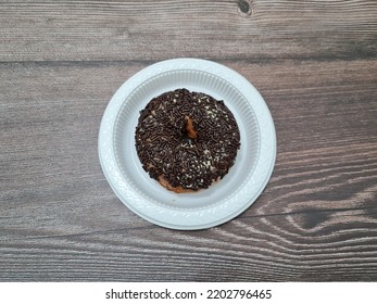 Cake Made From Flour And Other Ingredients, Namely Donut Cake Sprinkled With Chocolate Messes