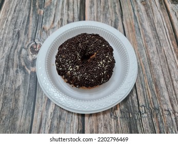 Cake Made From Flour And Other Ingredients, Namely Donut Cake Sprinkled With Chocolate Messes