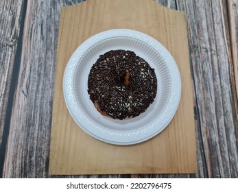 Cake Made From Flour And Other Ingredients, Namely Donut Cake Sprinkled With Chocolate Messes