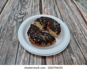 Cake Made From Flour And Other Ingredients, Namely Donut Cake Sprinkled With Chocolate Messes