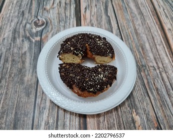 Cake Made From Flour And Other Ingredients, Namely Donut Cake Sprinkled With Chocolate Messes