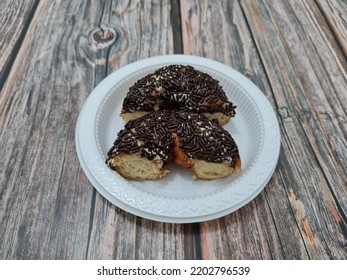 Cake Made From Flour And Other Ingredients, Namely Donut Cake Sprinkled With Chocolate Messes