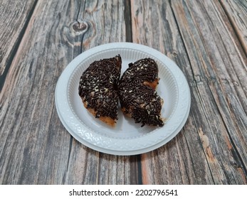 Cake Made From Flour And Other Ingredients, Namely Donut Cake Sprinkled With Chocolate Messes