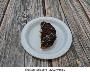 Cake Made From Flour And Other Ingredients, Namely Donut Cake Sprinkled With Chocolate Messes