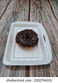 Cake Made From Flour And Other Ingredients, Namely Donut Cake Sprinkled With Chocolate Messes