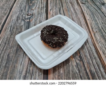 Cake Made From Flour And Other Ingredients, Namely Donut Cake Sprinkled With Chocolate Messes