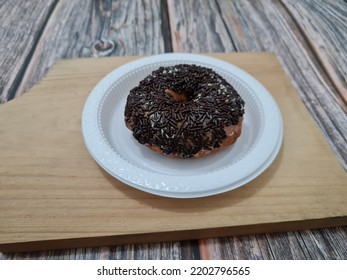 Cake Made From Flour And Other Ingredients, Namely Donut Cake Sprinkled With Chocolate Messes