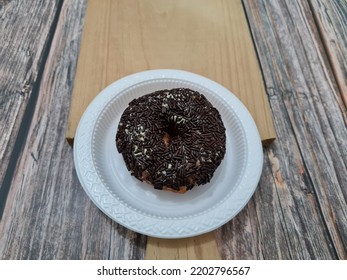 Cake Made From Flour And Other Ingredients, Namely Donut Cake Sprinkled With Chocolate Messes