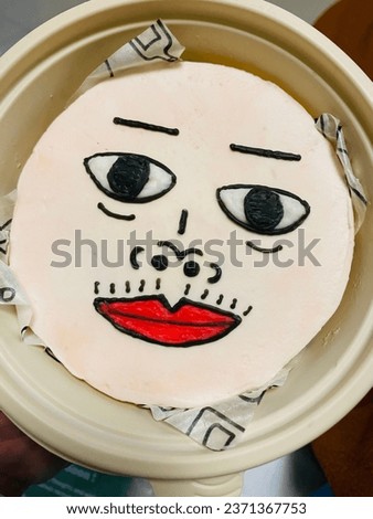 Cake with man's face design