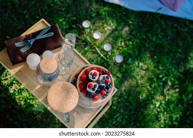 Cake On A Tray At A Garden Party
