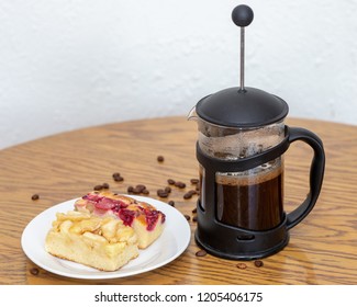 Cake With Rhubarb And Apple. Coffee In French Press. Grains Of Coffee On The Table.