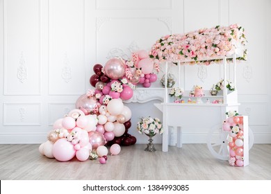 Cake Stand With Pink Cake Flowerpots, Geometric Flower Holder, Cup Cakes, And Balloon Cascade