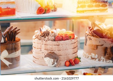 cake with strawberries, yummy assortment baked pastry in bakery. Various Different Types Of Sweet Cakes In Pastry Shop Glass Display. Good Assortment Of Confectionery. buffet with many desserts. - Shutterstock ID 2161029777