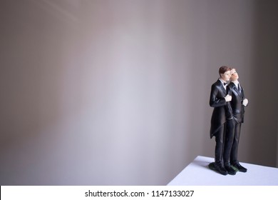 Cake Topper Gay Wedding Couple Of Two Male Grooms Holding Romantic Marriage Embrace Of LGBT Love.