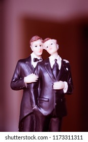 Cake Topper Gay Wedding Couple Of Two Male Grooms Holding Romantic Marriage Embrace Of LGBT Love.