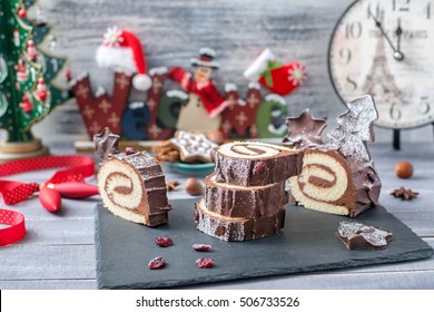 Cakes Bush de Noel Christmas Log on New Year background