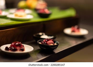 Cakes, Ice Cream With Blueberry Sauce, And Pastry In The Buffet Hotel Bar. Sweet Dessert