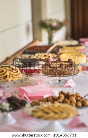 Cakes on buffet on a wedding, sweet desserts baked with nuts, Nusshörnchen to eat after dinner on a birthday Stock foto © 