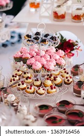 cakes, sweets and drinks stand on the table in the wedding banquet area - Shutterstock ID 1363916456