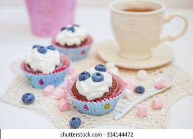 cakes and tea on a table, selective focus
