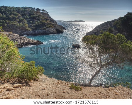 Cal d en Monjo bay  between  Peguera, Calvia and Andratx, Majorca island, Spain. Blue water in cirlce bay in hiden in deep rocks. Stock fotó © 