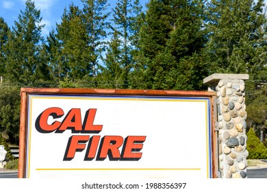 CAL FIRE Sign At Fire Station. Green Tree Forest Background - Santa Cruz, California, USA - 2021