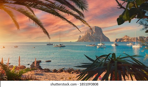 Cala d'Hort beach. Cala d'Hort in summer is extremely popular, beach have a fantastic view of the mysterious island of Es Vedra. Ibiza Island, Balearic Islands. Europe, Espana, Spain - Shutterstock ID 1851093808