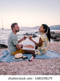 Cala Gonone Sardinia Italy Young Couple Eating Pizza On The Beach , Happy Guy And Girl Eating Pizza