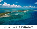 Calabash Caye, Turneffe Atoll in Belize - aerial drone image inside the reef at Turneffe Atoll Marine Reserve