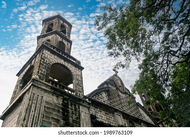 Calamba, Laguna, Philippines - June 2021: Saint John The Baptist Parish Church, A Stone Roman Catholic Church Of Baroque Style Architecture.