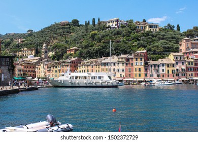 calata del porto - Portofino, Italian River with the boats port and the colorful buildings at the coast 