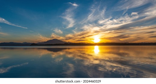 Calbuco volcano panorama at sunrise by Llanquihue Lake, Puerto Varas, Chile. - Shutterstock ID 2024460329