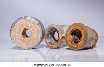 Calcified and rusty water line in installation