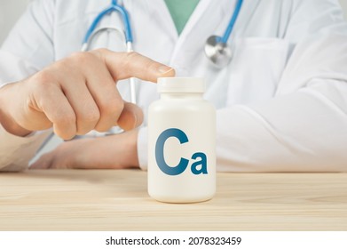 Calcium Ca Supplements For Bone Human Health. Doctor Recommends Taking Calcium Ca. Doctor Talks About Benefits Of Calcium. Essential Vitamins And Minerals For Humans. Calcium Health Concept.