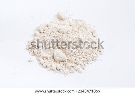 Calcium oxide CaO, commonly known as quicklime or burnt lime. On white background.