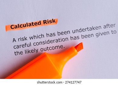 calculated risk word highlighted on the white paper