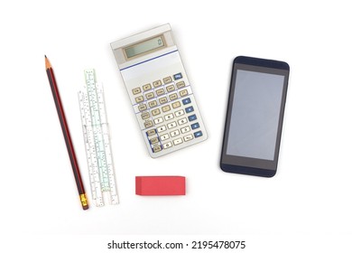 Calculating Tools From Different Times, From Paper And Pencil To A Vintage Slide Rule, Old Electronic Calculator And A Smartphone