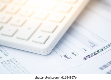 Calculator And Bill Payment As Background. Income, Expenses, Tax, Financial Data.