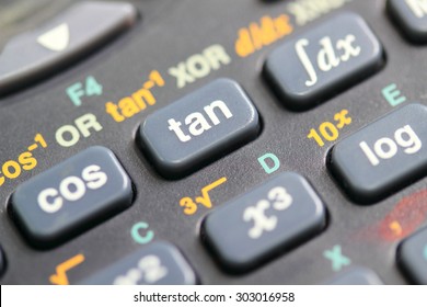 Calculator close-up shot focus on Sine, Cosine, Tangent