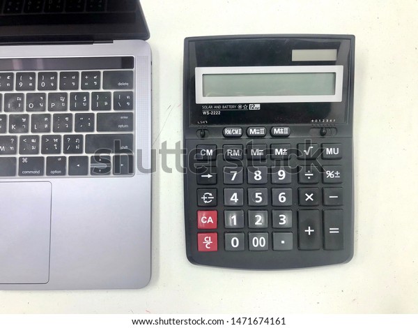 calculator and computer for calculate income and\
outcome in store