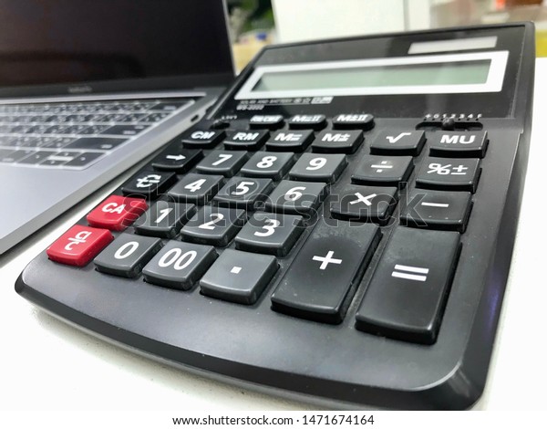 calculator and computer for calculate income and\
outcome in store